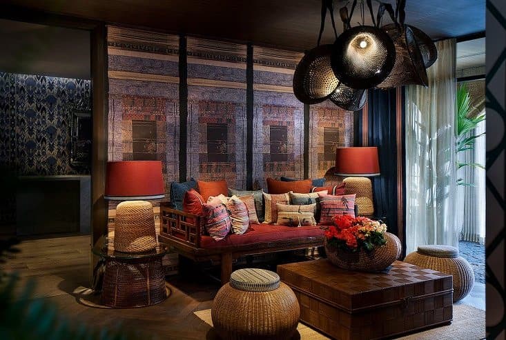Jim Thompson Surawong interior lounge with silk textiles and cushions