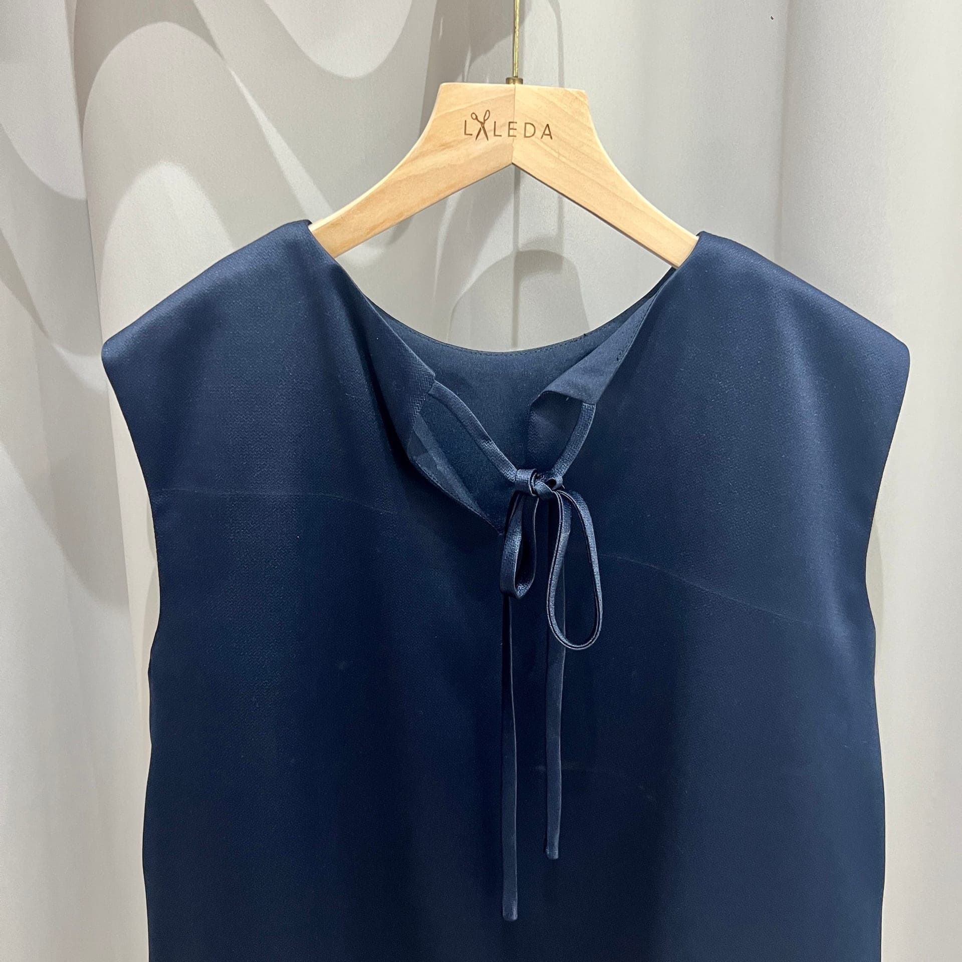 Camel wool coat with oversized collar and belt