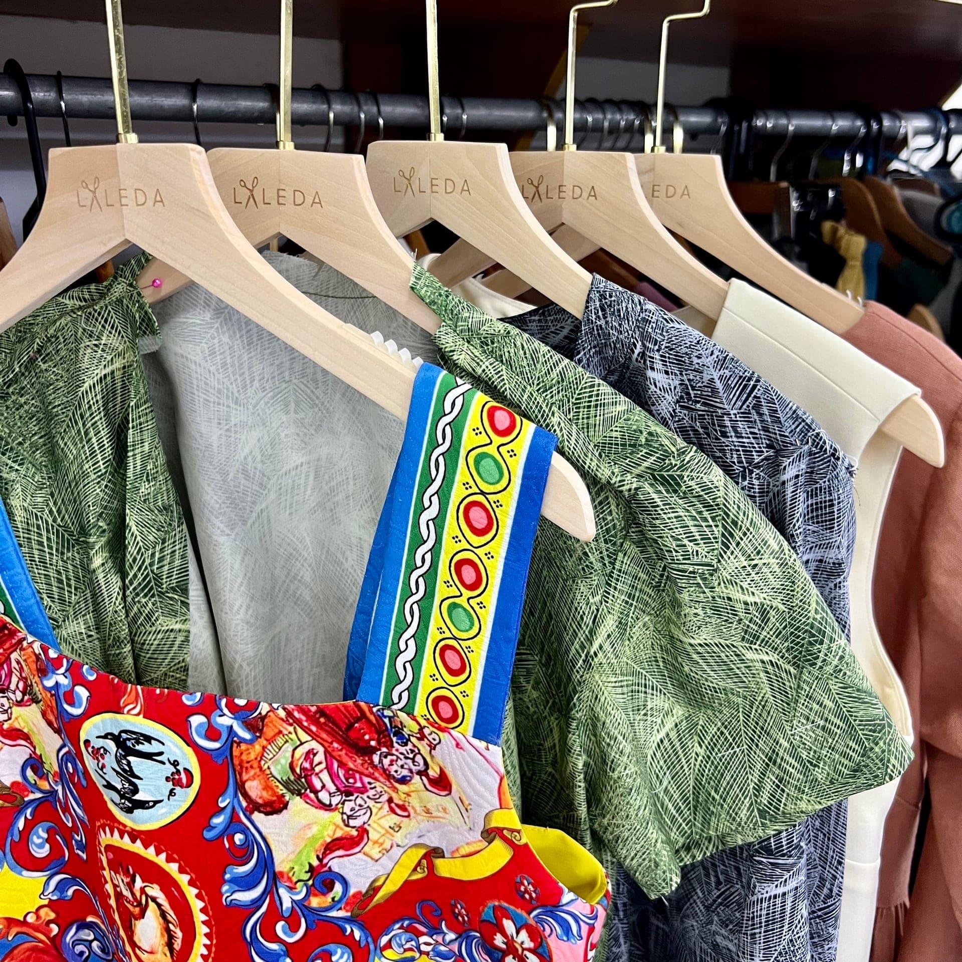 Custom tailored coral midi dress with fitted bodice