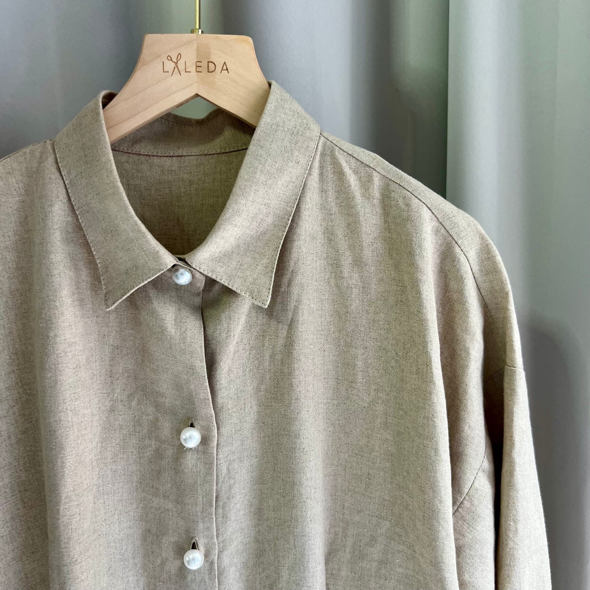 Coral pleated chiffon midi dress with halter neck