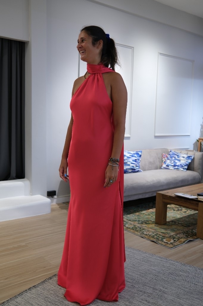 Coral red custom halter maxi dress fitted at the LALEDA atelier