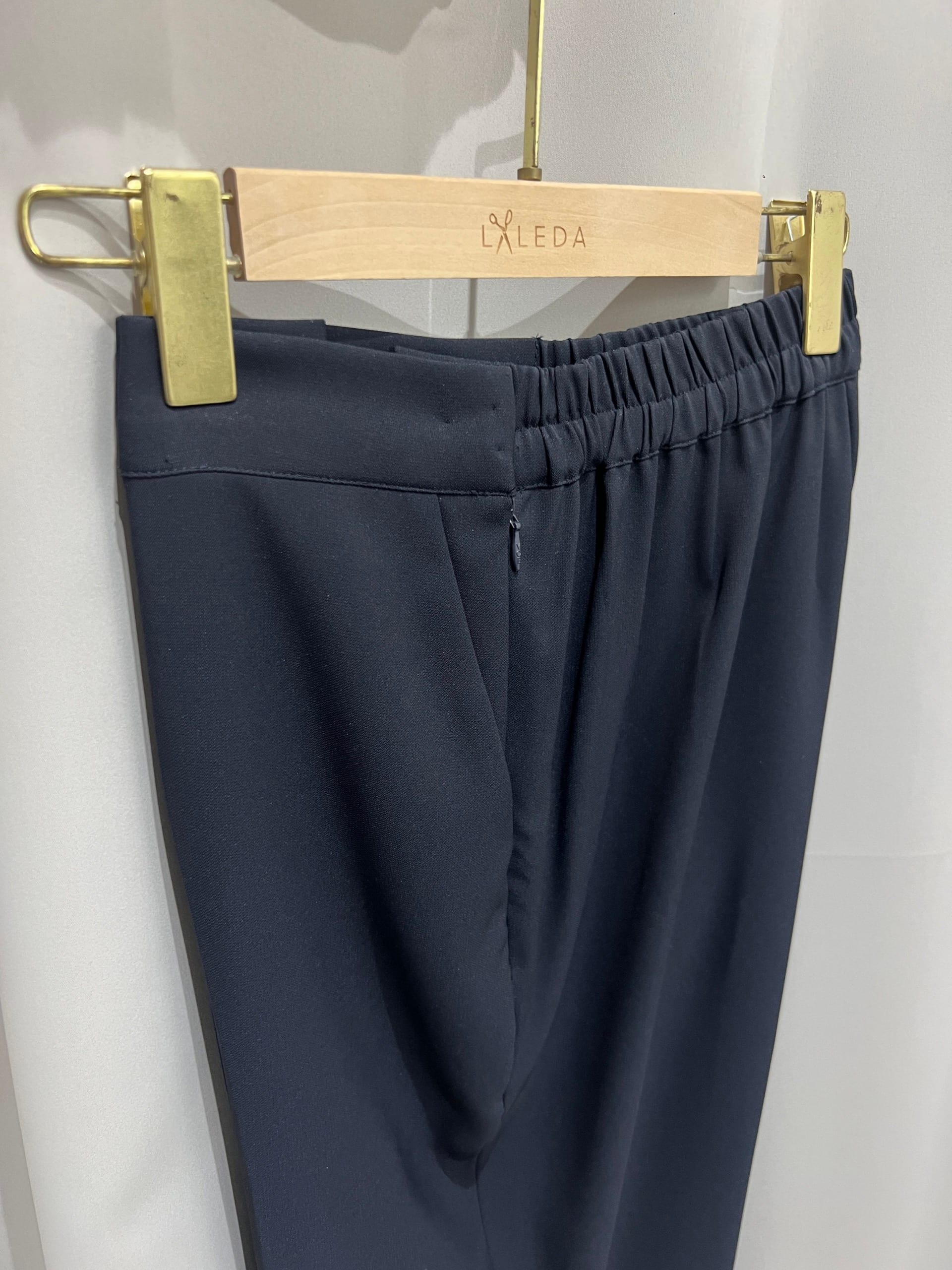 Dark navy tailored trousers with side zip