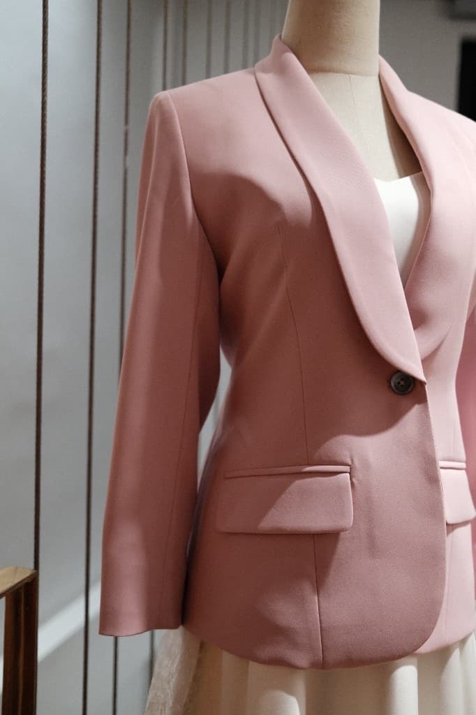 Finished dusty rose shawl-collar blazer on a mannequin