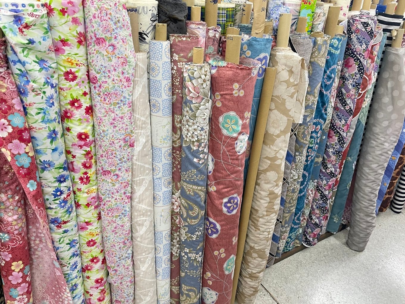 Interior of Hieng Yoo Huat fabric store with bolts of fabric