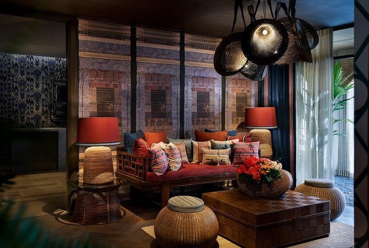 Jim Thompson Surawong interior lounge with silk textiles and cushions