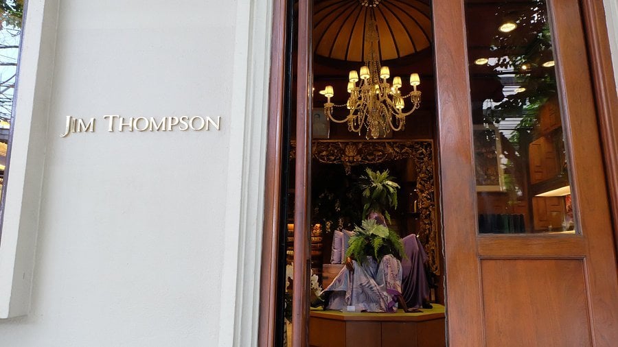 Jim Thompson Surawong store doorway with silk displays in the window