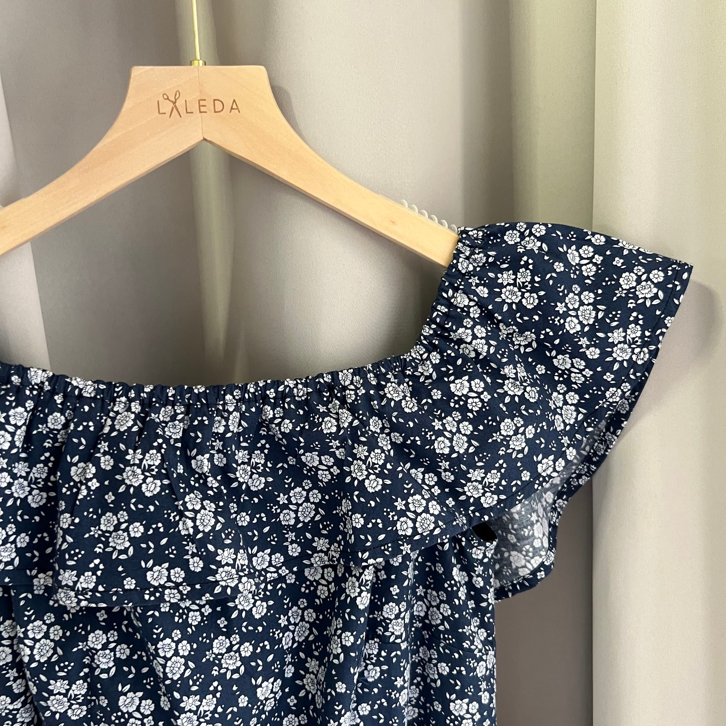 Ivory organza cocktail dress with bow waist detail