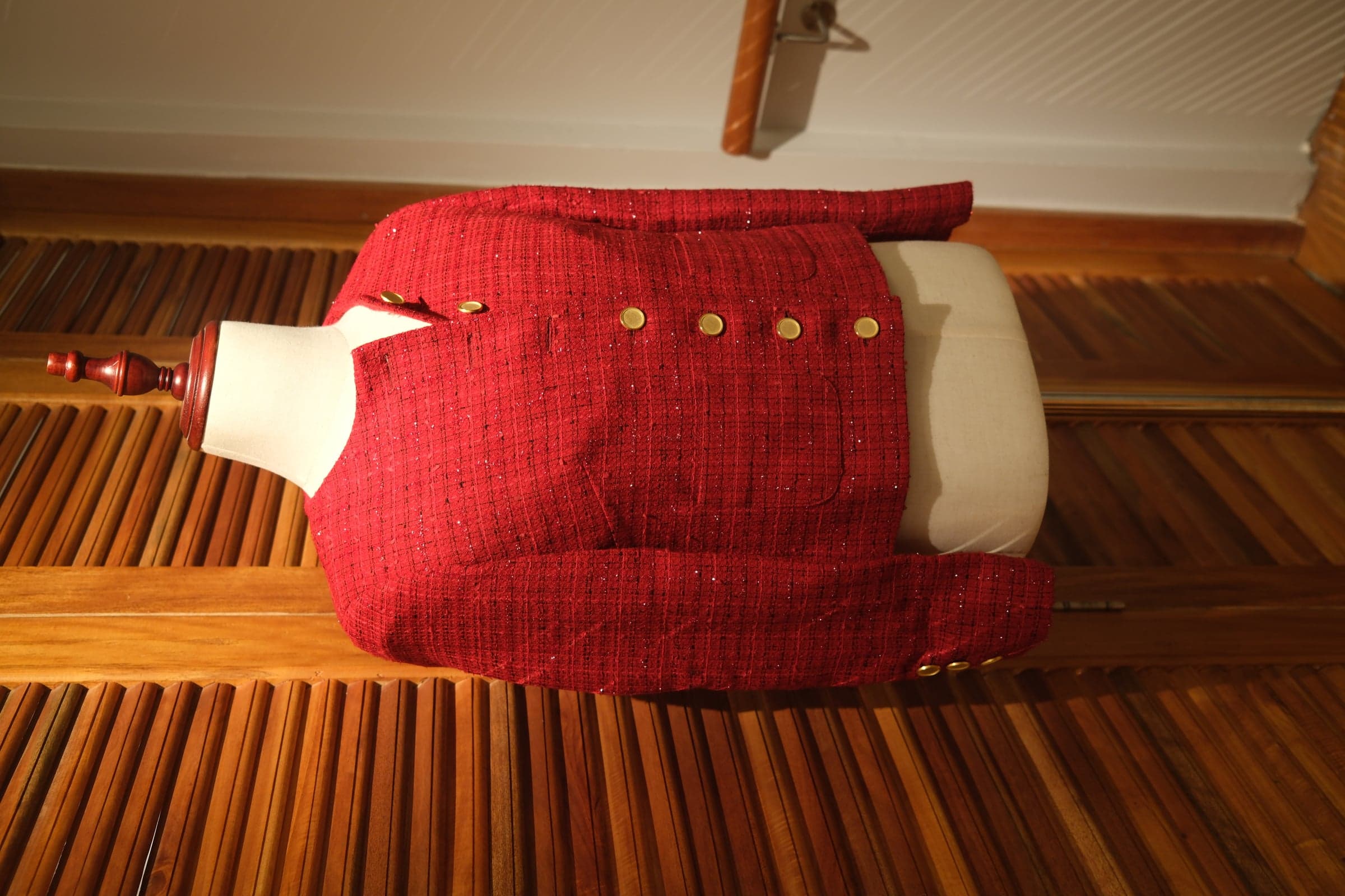 Red Chanel-style women's jacket