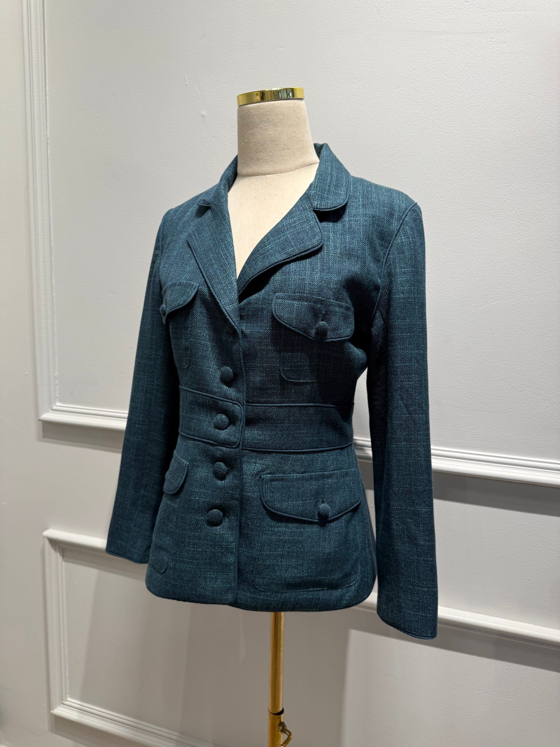 Teal textured fitted blazer with flap pockets
